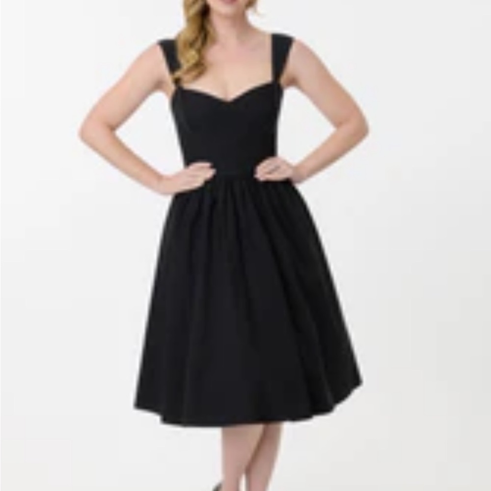 Unique Vintage black swing dress